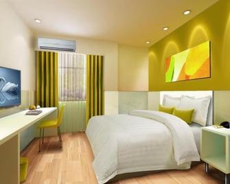 Shell Qionghai Jinhai Road Hotel - Qionghai - Bedroom