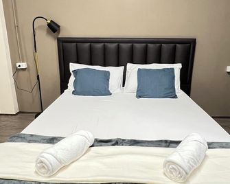 The Cage Suites - בנגקוק - חדר שינה