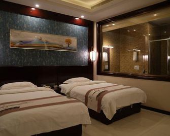 Saina Island Hot Spring Hotel - Tianjin - Slaapkamer