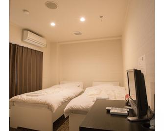 Doushin Business Inn - Kōbe - Schlafzimmer