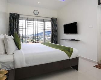 Treebo Light House, 900 Mtrs From Botanical Garden - Ooty - Спальня