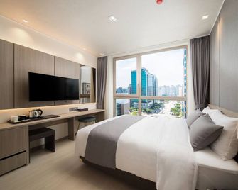 Utop Boutique Hotel and Residence - Kwangdžu - Ložnice