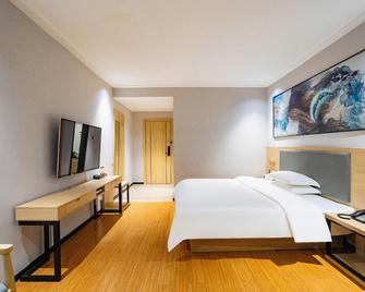Celebrity Hotel (Wanda Plaza) - Yulin - Bedroom