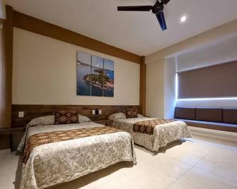 Hotel Casa Ixtapa - Ixtapa - Schlafzimmer