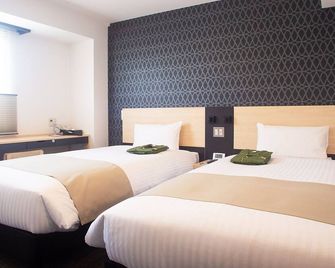 Hotel Kuretakesou Hiroshima Otemachi - Hiroshima - Bedroom