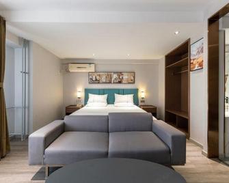 Jinjiang Inn Tianjin Konggang Branch - Tianjin - Schlafzimmer