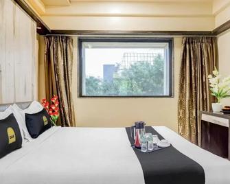 Fabhotel Regal Inn Pimpri Chinchwad - Pimpri - Chinchwad - Camera da letto