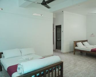 Suryas Stay Inn - Varkala - Bedroom