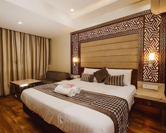 The Deep Hotel - Kanpur - Schlafzimmer
