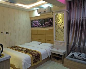 Hulunber Yijia Hotel - Hulunbuir - Спальня