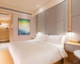 Ji Hotel Ordos Wanzheng Plaza - Ordos City - Yatak Odası