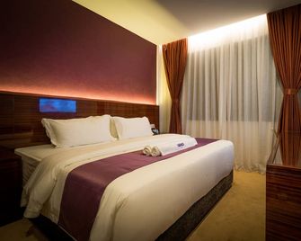 Wiwo Hotel - Bintulu - Schlafzimmer