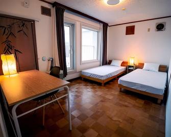 Winter Whale Lodge - Niseko - Schlafzimmer