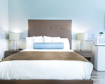 Ocean Echo Inn And Beach Cottages - סנטה קרוז - חדר שינה