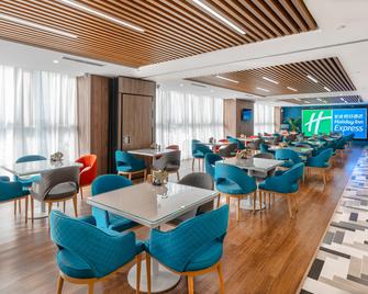 هوليداي إن إكسبرس تيانجين دونغلاي باي آيتش جي - تيانجين - مطعم