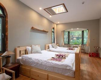 Guizu Buluo Senlinjia Hostel - Nanjing - Bedroom