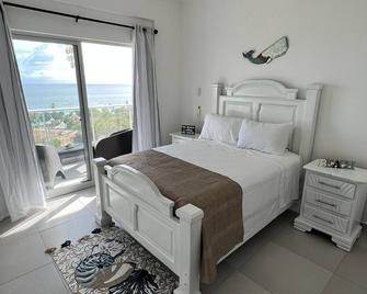 Cozy Oceanview+Pool+Gym+Airport 20 minutes Apartment - Juan Dolio - Bedroom