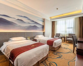 Wanguo Mingyuan Business Hotel - Yulin - Habitación