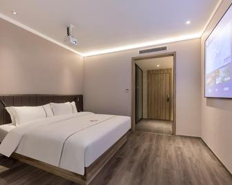 Hanting Hotel Changzhou Xinbei Wanda - Changzhou - Kamar Tidur