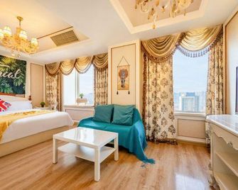 Ganghui Four Seasons Hotel Apartment (Dalian Railway Station Zhongshan Square) - Dalian - Schlafzimmer