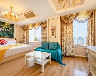 Ganghui Four Seasons Hotel Apartment (Dalian Railway Station Zhongshan Square) - Dalian - Bedroom