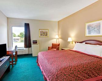 Days Inn & Suites by Wyndham Louisville SW - Louisville - Bedroom