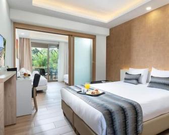 Poseidon Resort Hotel - Néos Marmarás - Bedroom