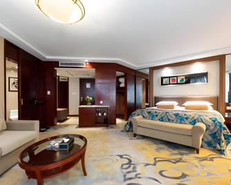 Jingwei International Hotel - Jingzhou - Спальня