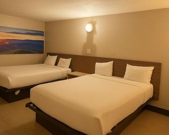 Economy Inn Little Rock - ליטל רוק - חדר שינה