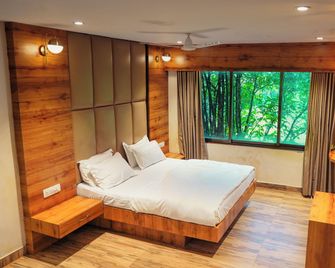 Whispering Peepul Resort - Badlapur - Bedroom