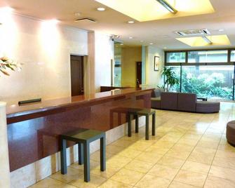 Smoking semidouble roomGreat value for couples / Kuwana Mie - Kuwana - Front desk