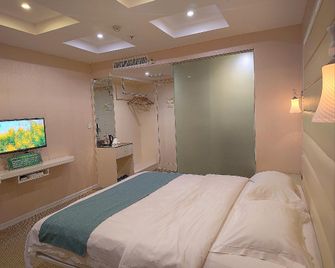 Dequan Hotel - Fangchenggang - Habitación