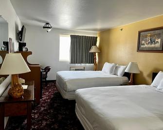 Buffalo Bill's Antlers Inn - קודי - חדר שינה