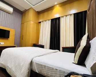 Hotel New Holiday - Bhīlwāra - Habitación