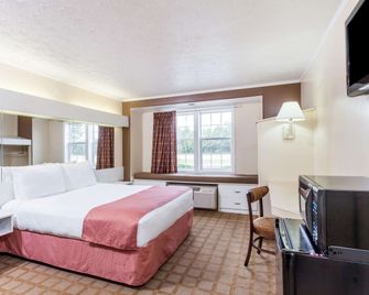 Microtel Inn & Suites by Wyndham Wilson - Wilson - Спальня