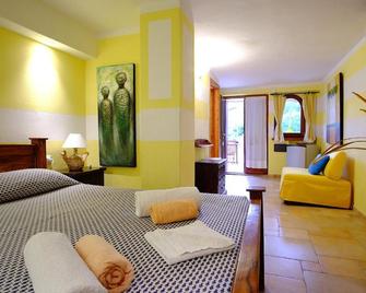 Villa Minda Lodge & View - San Teodoro - Habitación