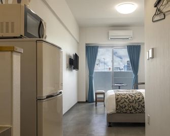 Mr.Kinjo In Miegusuku - Naha - Schlafzimmer