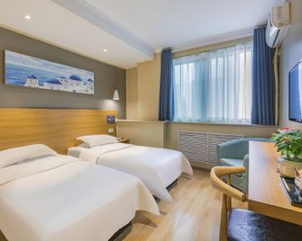 Super 8 by Wyndham Beijing Xi Zhi Men - בייג'ין - חדר שינה