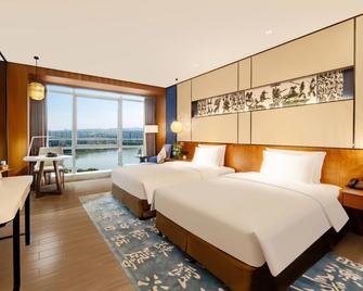 Fliport Garden Hotel Xiamen Airport - Xiamen - Bedroom