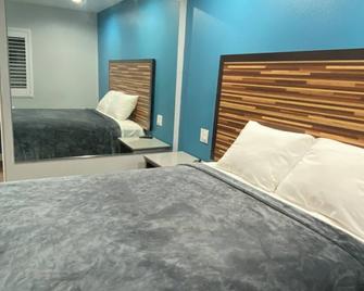 Plaza Inn Motel - רוזמיד - חדר שינה