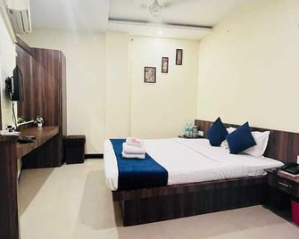 Hotel Ashoka Palace - אויאיין - חדר שינה