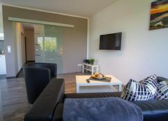 Ferienwohnung Dorfbrunnen - Merzig - Huiskamer