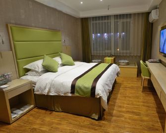 Dongtai Dashijie Hotel - Dandong - Camera da letto