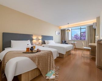 Hanting Hotel (Xichang Qionghai Wetland Park) - Liangshan - Schlafzimmer