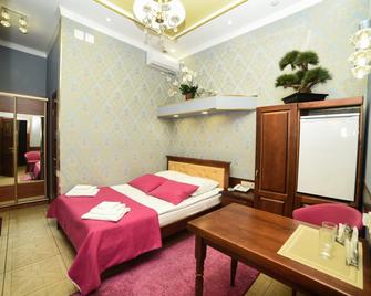 Hotel Boston on Baltakhinova 17 - Ulán-Udé - Habitación