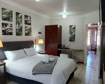 Premiere Guesthouse - Bloemfontein - Bedroom