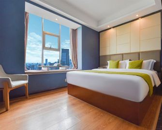 Jingshe Lotus Hotel (Shaoyang High-speed Railway Station Branch) - Shaoyang - Bedroom