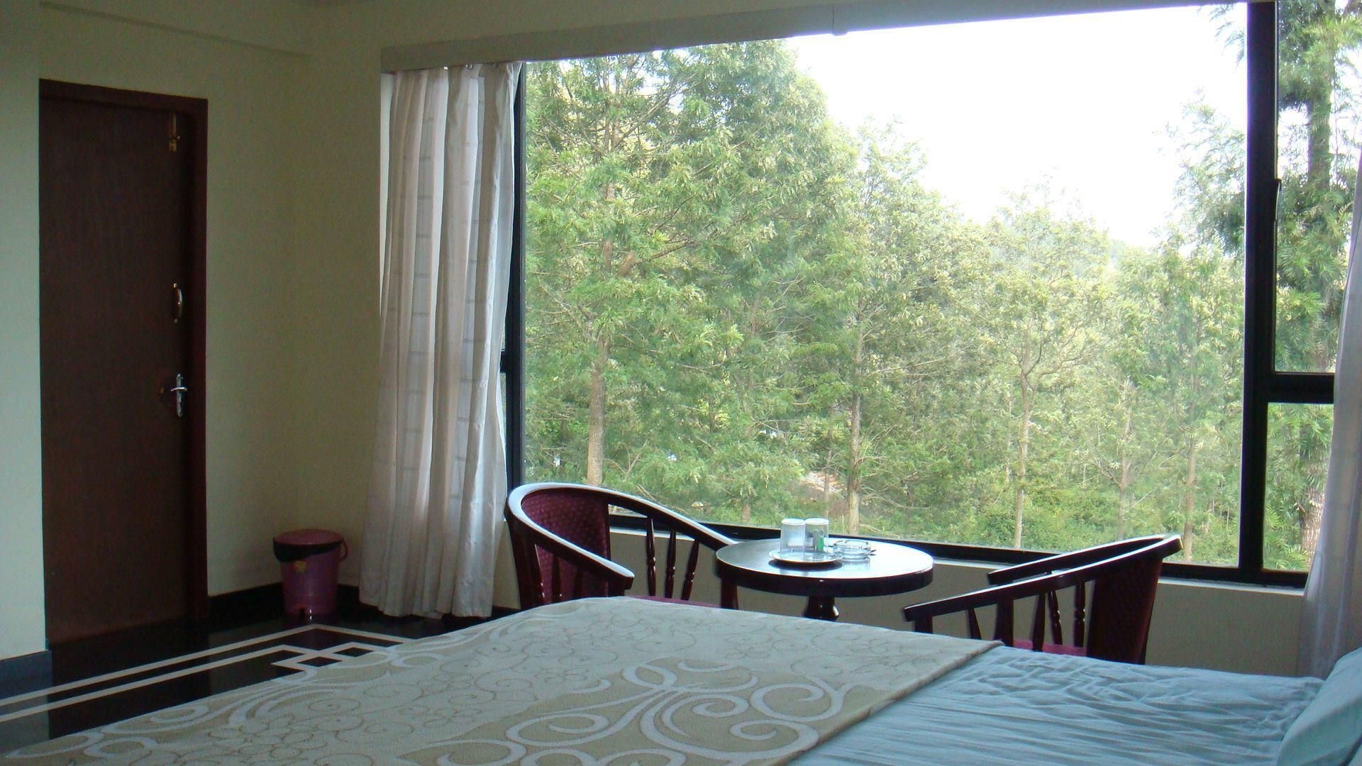 Sri Durga Residency - Yercaud - Schlafzimmer