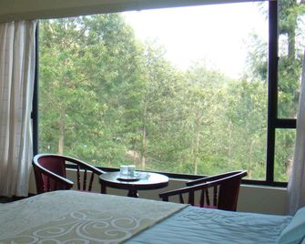 Sri Durga Residency - Yercaud - Schlafzimmer
