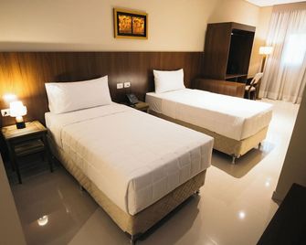 زيلو هوتل - اسونسون - غرفة نوم